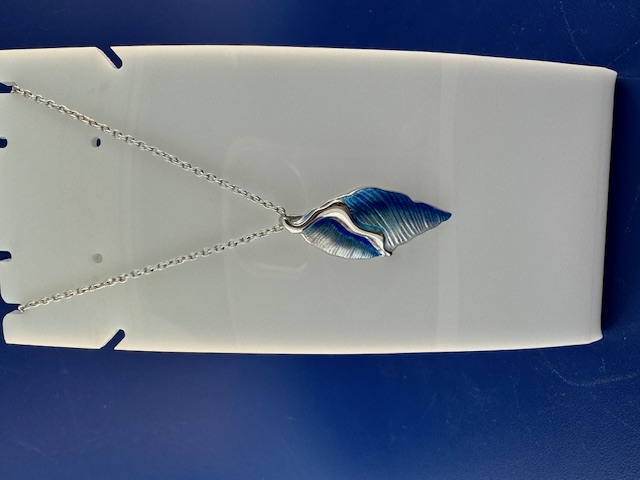 Blue conch shell pendant in sterling silver and enamel