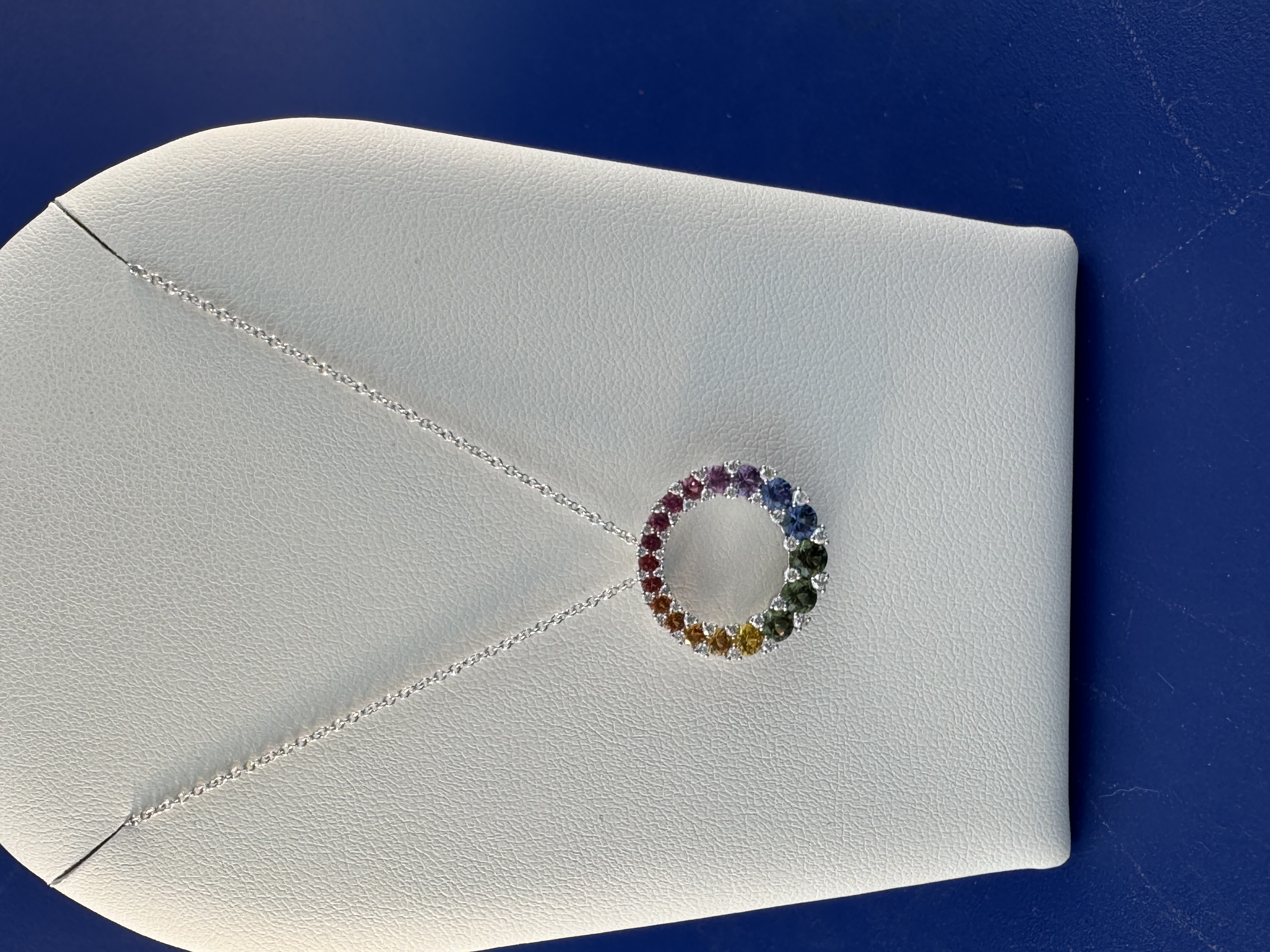 18 kt rainbow sapphire pendant