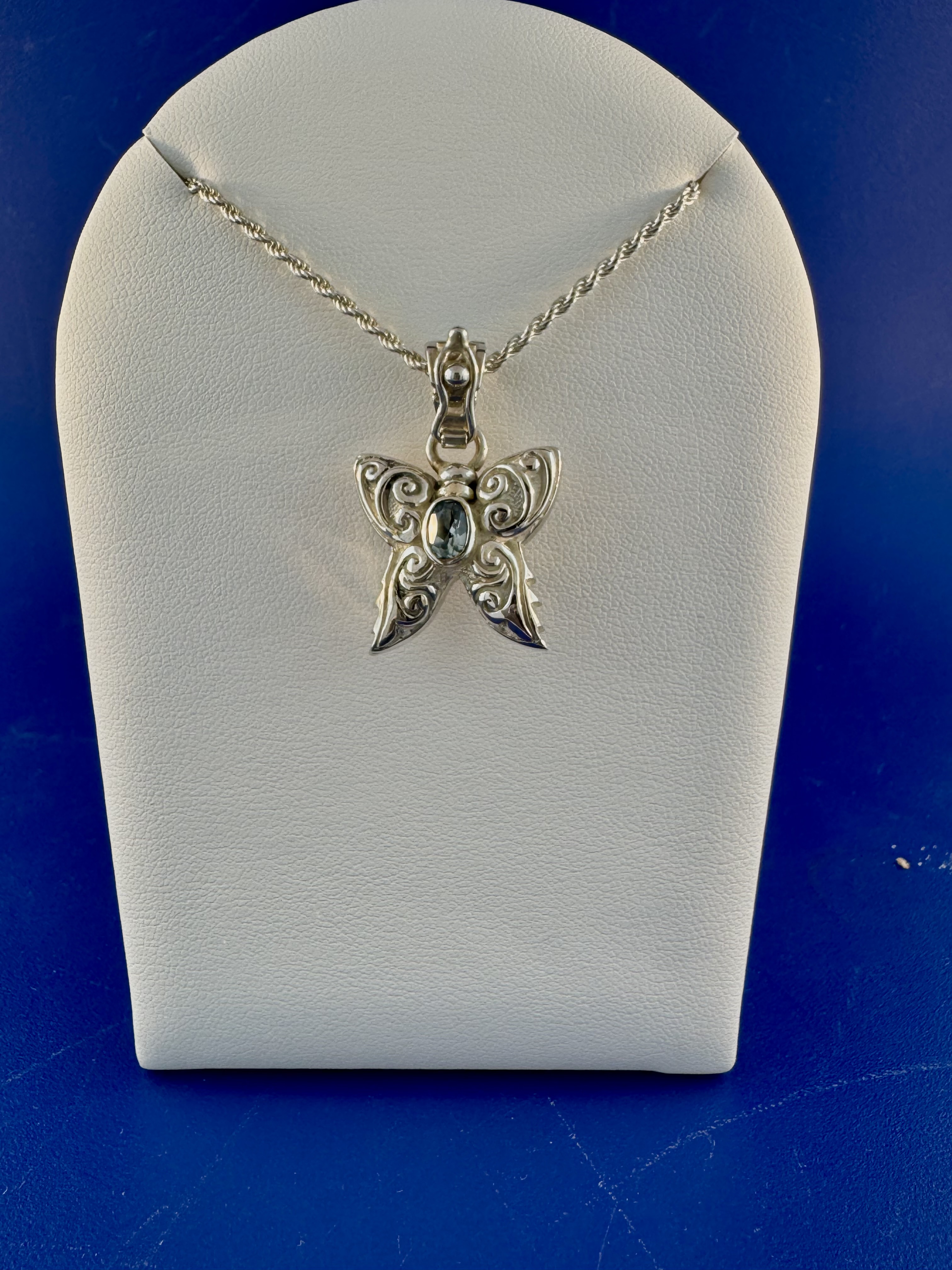 Sterling silver and 18 kt blue topaz butterfly pendant
