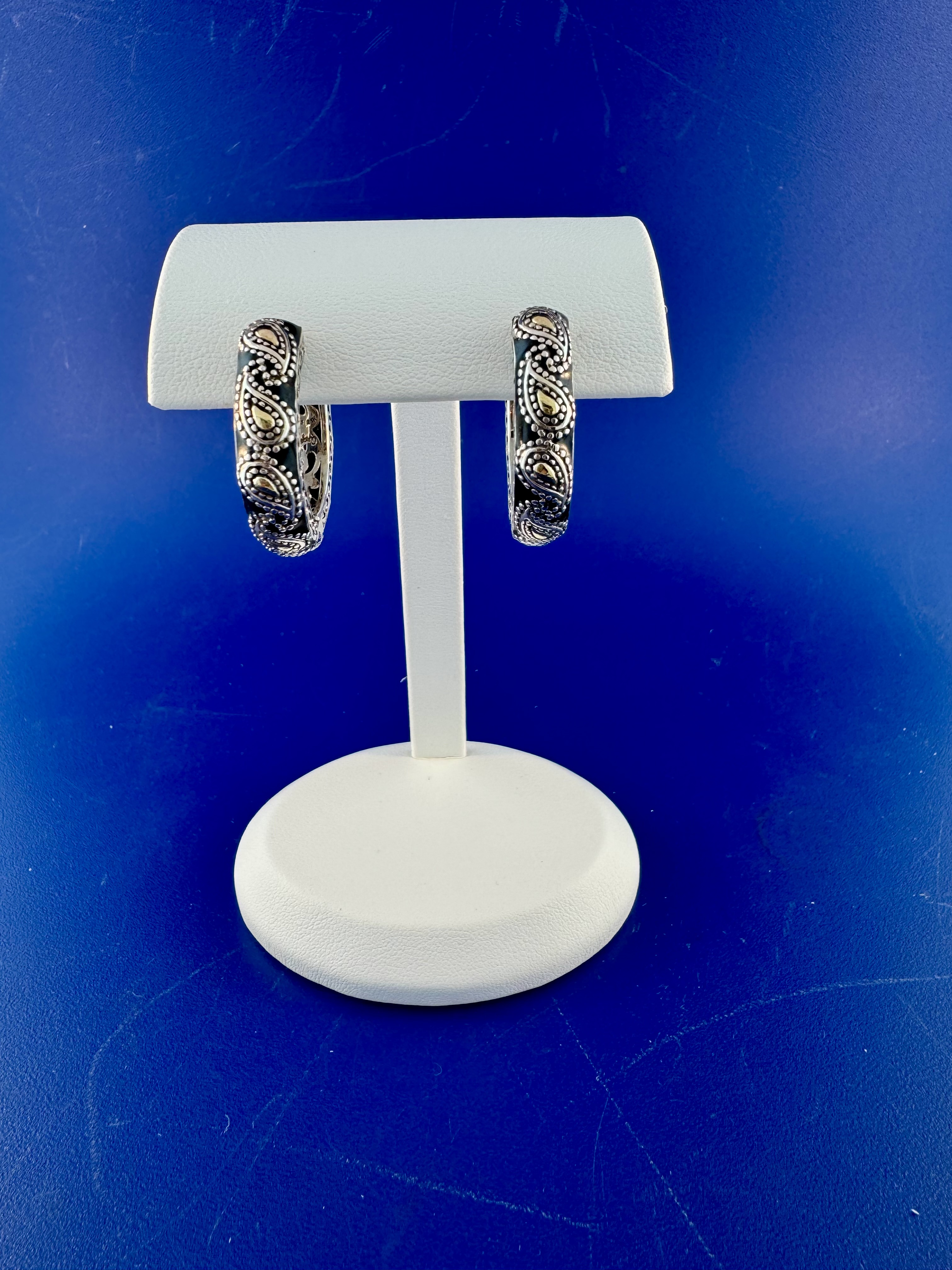 Sterling silver and 18 kt black onyx hoop earrings