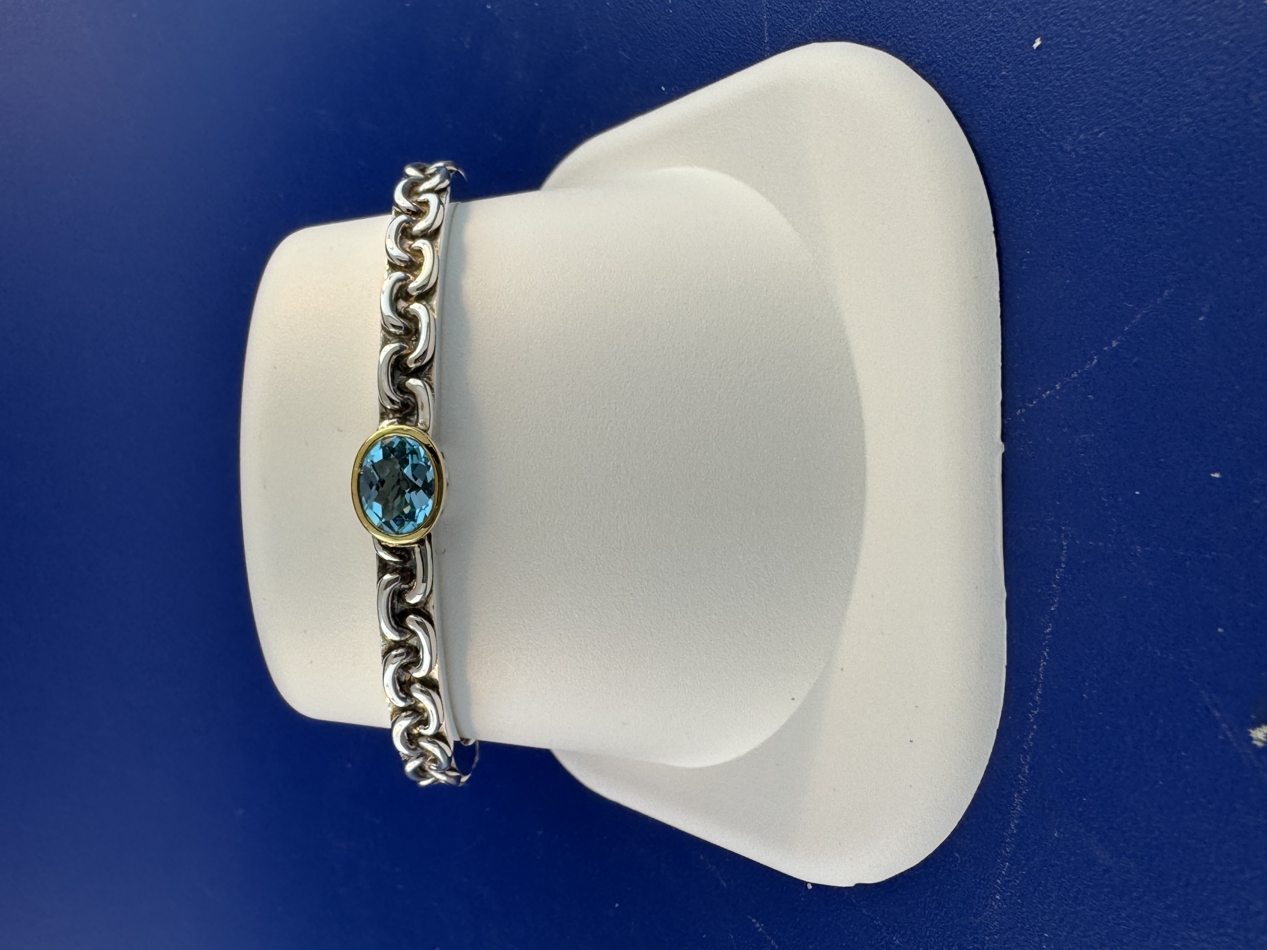 Sterling silver and 18 kt blue topaz cuff