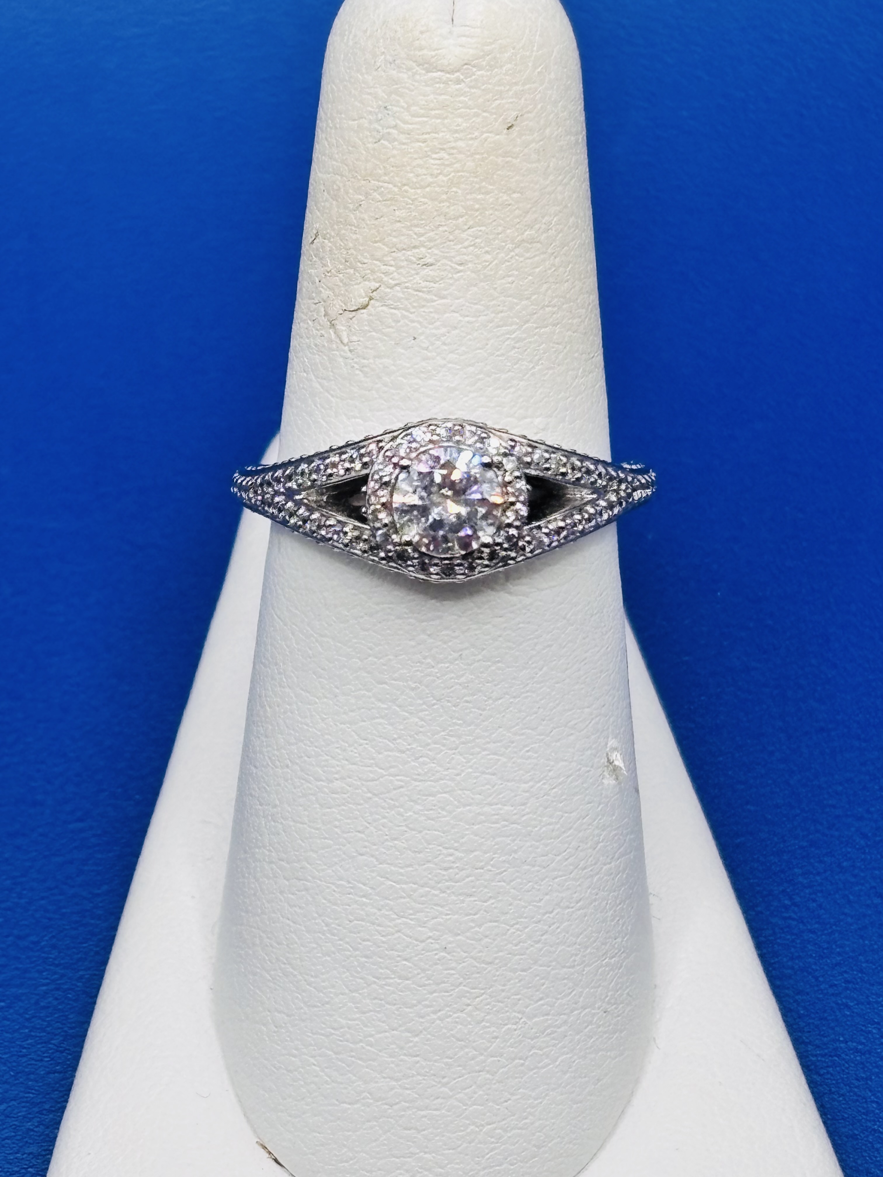 Split shank Halo Diamond Ring